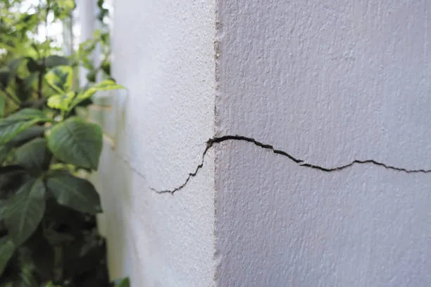Diagonal foundation crack in interior wall — a sign of structural settlement